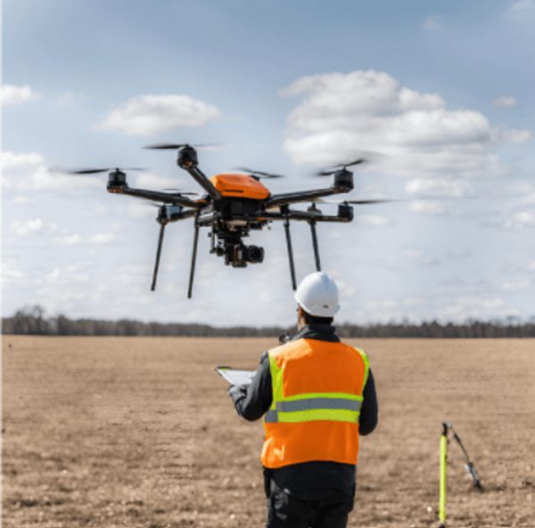 drone and a surveyor