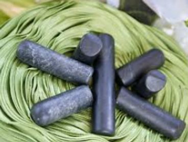 Dark smooth massage therapy stones.