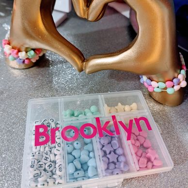 Beaded bracelets and beads with name Brooklyn.