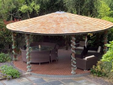 Timber shingle roof, Four oaks, tikki hut sytle roof