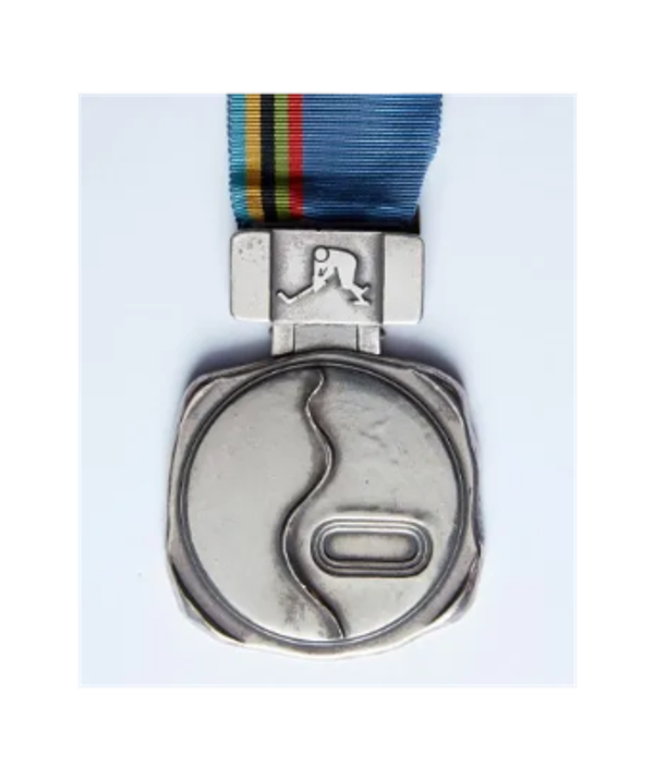 1972 Olympic silver medal for hockey. Awarded to Henry Boucha of Team USA. He was a member of the A