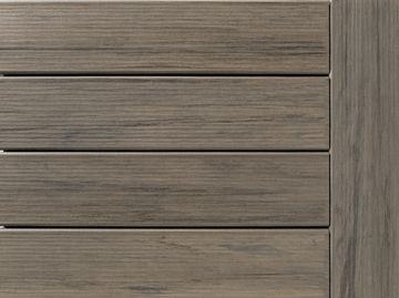 Wooden planks with a weathered gray finish.