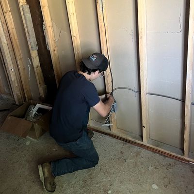 Residential rough-in wiring by Cox Electric, Heating & Cooling in Southeast Michigan.