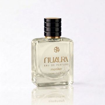 Clear glass perfume bottle labeled Nuaura Eau de Perfume Moniker.