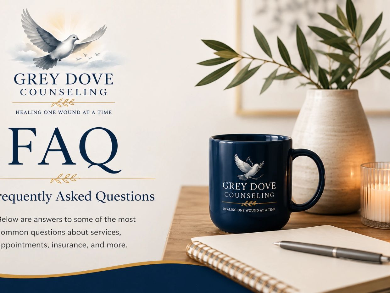 Grey Dove Counseling FAQ with a calming desk setup including a mug, notebook, and plant.