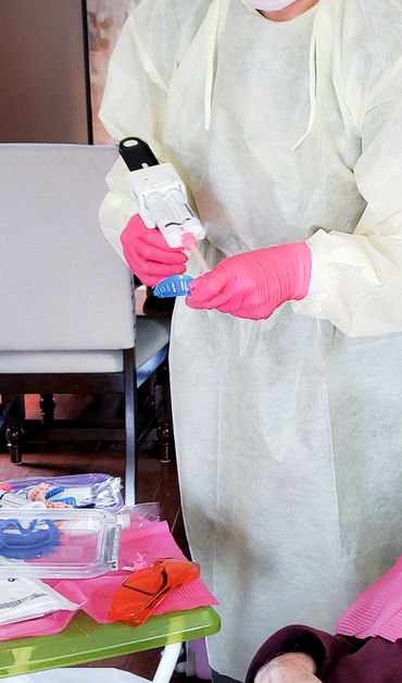 Mobile dental hygienist Monica Cordova setting up for dental impression for Philips Zoom