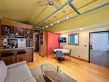 Bright living room in Ballard Seattle vacation rental with comfortable seating and natural light