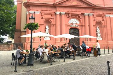 Great food in front of an impressive church facade