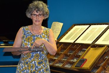 Loading the composing stick