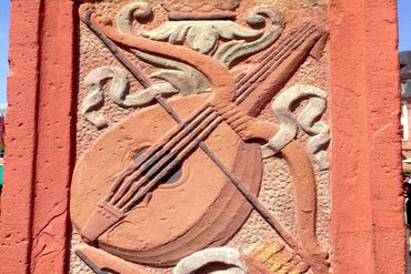 A carved lute on the Market Well, Mainz