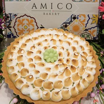 Decorative pie with toasted meringue topping from Amico Bakery.