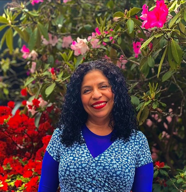 Woman striking a pose and smile her face