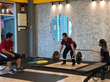 Coach Aquila conducting a Couple Training for husband and wife