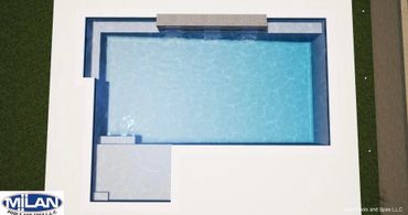Modern rectangular pool with built-in waterfall and spa area.