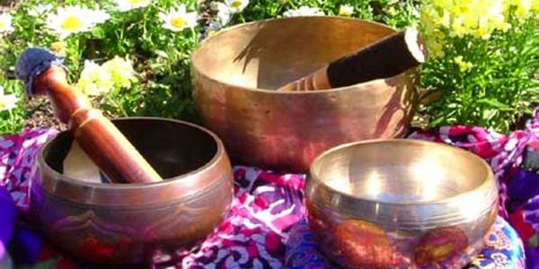 Three metal Himalayan singing bowls ready to play