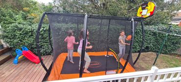 kids having fun on a trampoline