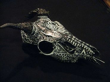 Tribal inspiration in patterns painted on a deer skull
