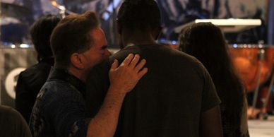 One man ministering to another