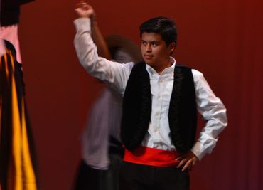 One of our male students performing on stage for one of our dance recitals 