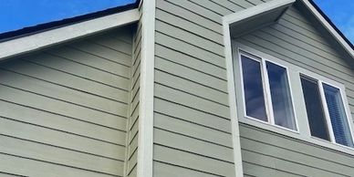 Image of one side of a house that highlights the siding.