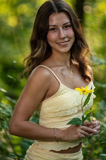 Brown-haired girl in a forest. Lea | SHS Senior | Forest | Class of 2026