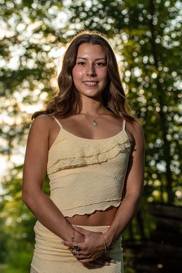 Brown-haired girl in a forest. Lea | SHS Senior | Forest | Class of 2026