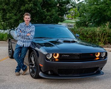 Brown-haired boy posing for pictures. Logan | HUHS Senior | Class of 2026