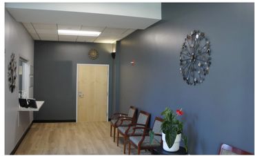 Tenant Improvement: Demise existing office space, stud framing for new office layout, new floors, re