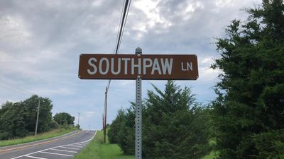 The Shops Street sign. "Southpaw Lane"