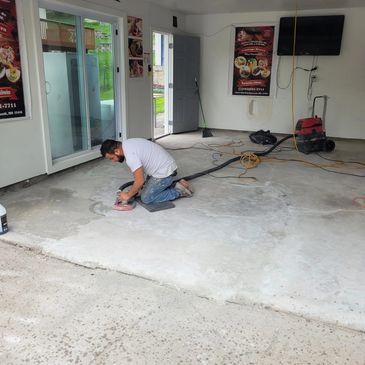 Local Team installing Epoxy Floors