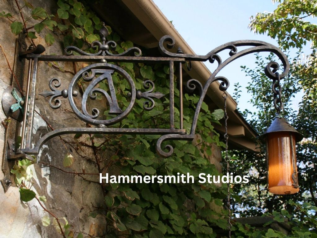 Hand forged bronze light bracket, custom design, Hand forged by Hammersmith Studios, custom blown gl