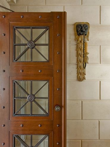 custom hand forged bronze inserts for door.