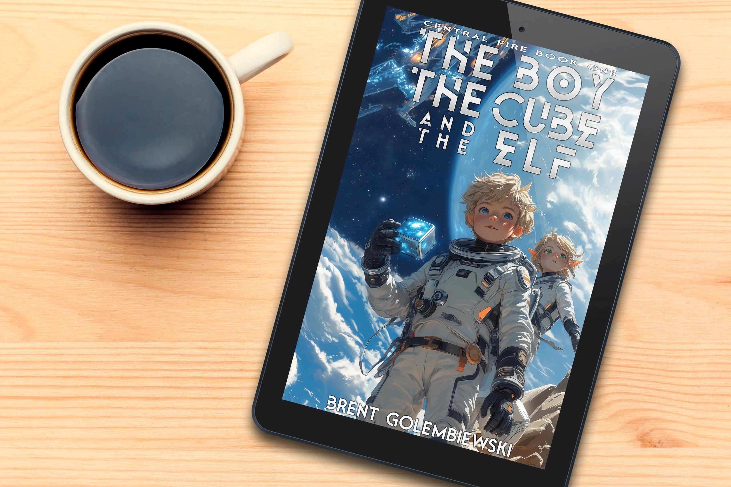 Tablet displaying sci-fi book cover with astronauts, next to a cup of coffee on wood.