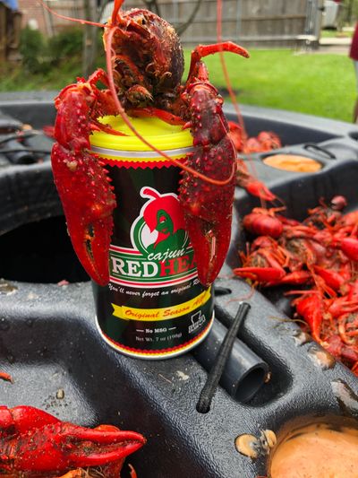 Lobster on a can of Cajun Redhead Seasoning