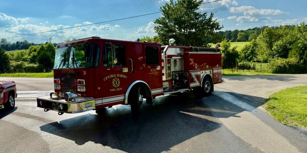 Red Central Harbor fire truck parked outdoors.