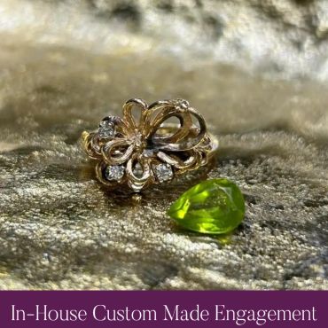 Original jewelry and loose green gemstone before custom redesign.