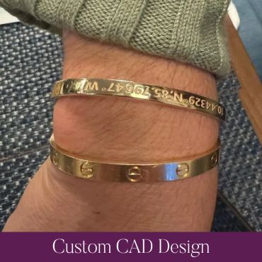 Finished custom gold coordinate cuff bracelet being worn.