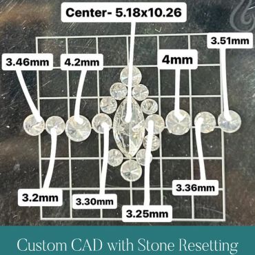 Loose diamonds measured and arranged for a custom marquise-shaped ring.