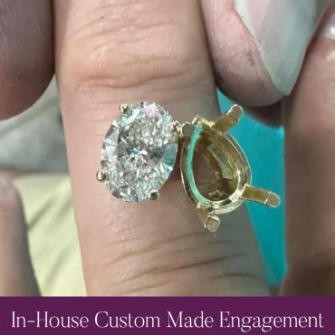 Loose diamond and empty setting prepared for a custom engagement ring.