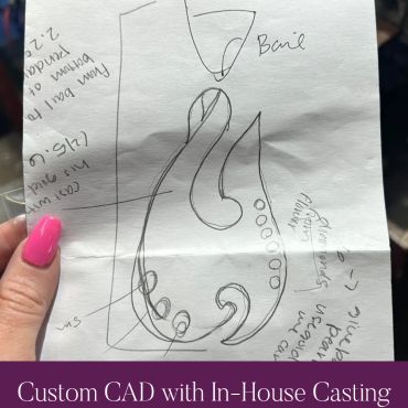Hand-drawn concept sketch for a custom fishhook pendant.