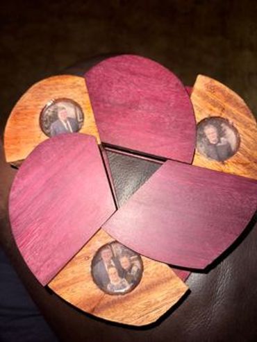 Unique wooden photo puzzle featuring family pictures.