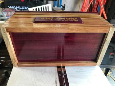 Artisan-made wooden box with custom design and finish