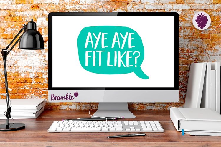 Designer's workspace. On the screen is a speech bubble with Doric words saying aye,aye, fit like?