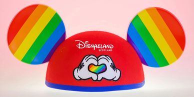 Doric Disnaeland  Mickey Moose Lugs branded hat. Mickey's rainbow ears.