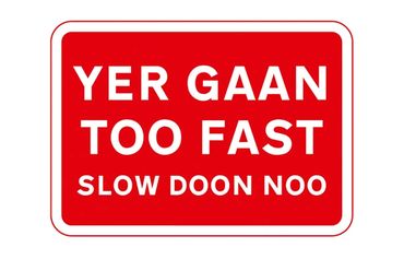 Doric Slow down road sign