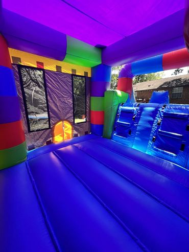 Inflatable bounce house waterslide