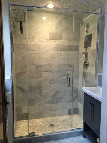 Header top glass shower enclosure with chrome hardware color