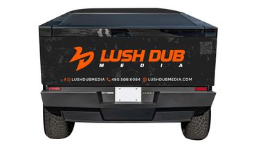 Custom business wrap for a Tesla Cybertruck. Cybertruck Vinyl Wrap