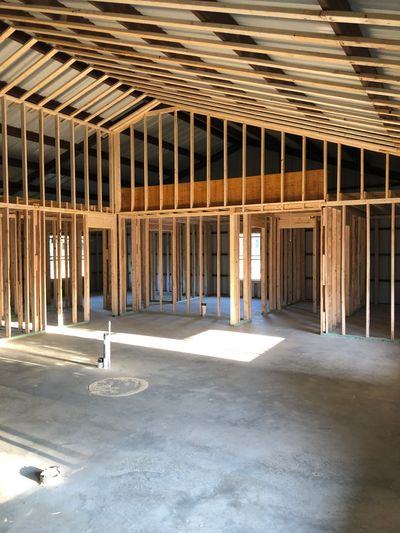 We use industry accepted standard wood framing of all interior walls, 2x4's on 16 inch centers. 
