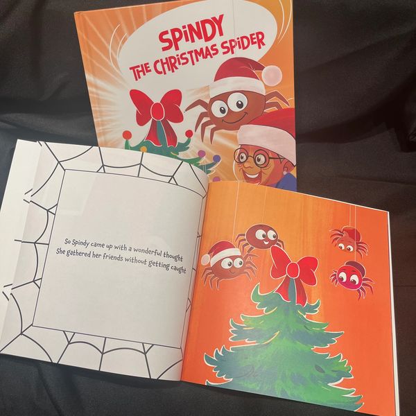 Children's book titled 'Spindy the Christmas Spider' with colorful, festive illustrations.